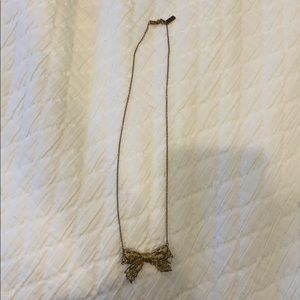 Gold bow necklace